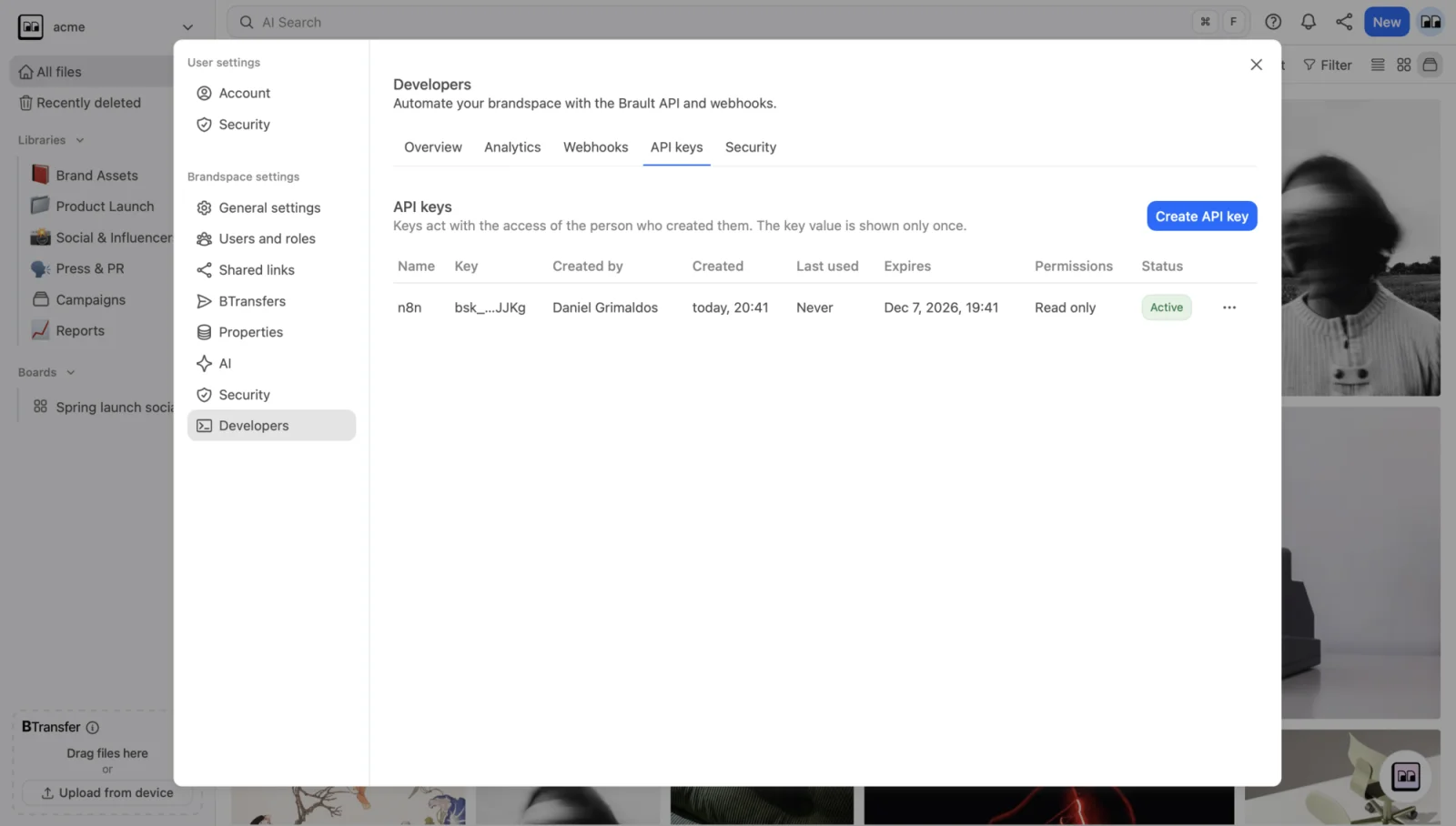 The API keys tab of the Developers panel listing keys with their prefix, scopes, creator and last use